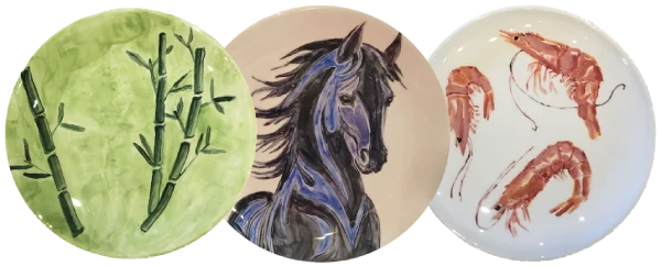 Three painted plates
