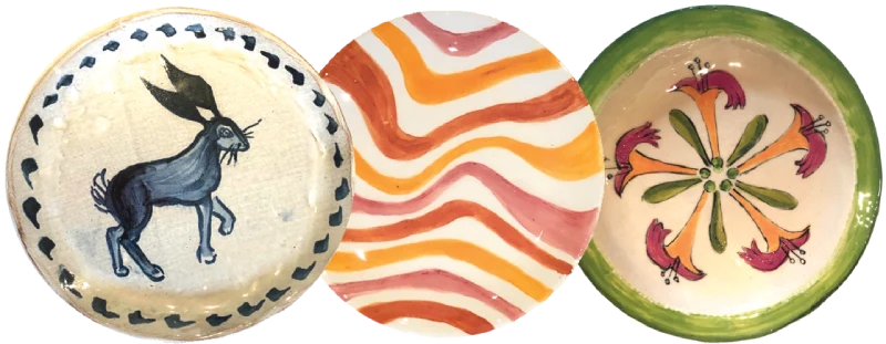 Three painted plates