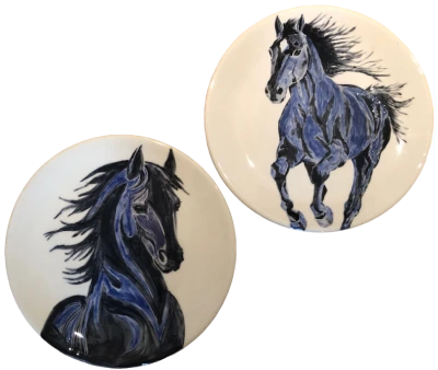 Two plates painted with horses